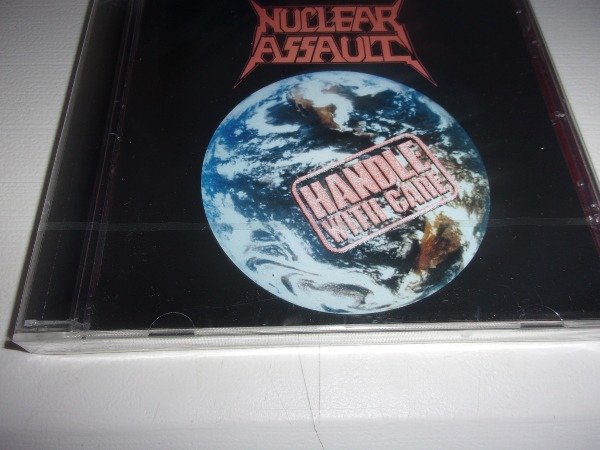 Producto - CD NUCLEAR ASSAULT HANDLE WITH CARE NUEVO EUROPA L51