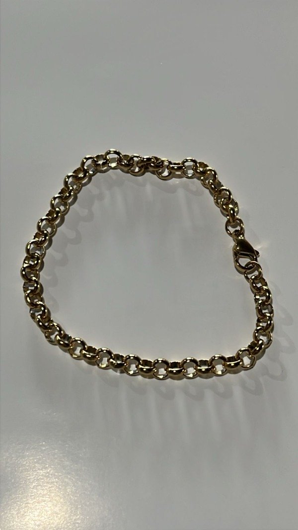 Producto - pulsera rolo acero dorado