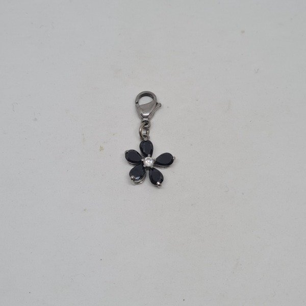 Producto - Dije flor negra