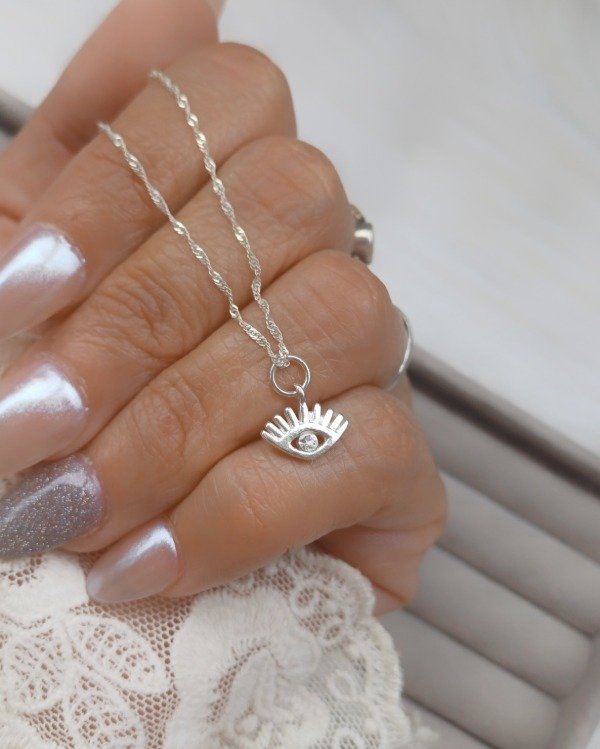 Producto - CONJUNTO OJITO CON CUBIC