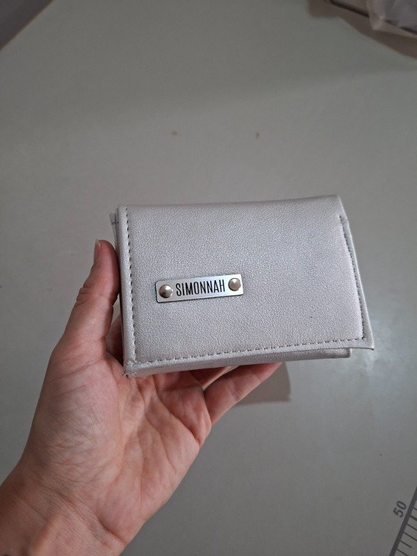 Producto - Mini billetera plata con falla minima