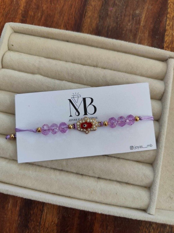 Producto - Pulsera manito violeta claro.