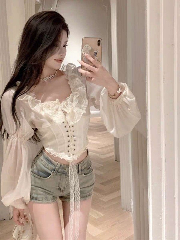 Producto - Top orset con mangas traasparentes