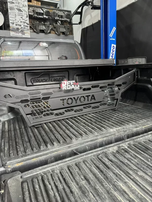 Producto - Divisor de caja de carga Toyota Hilux