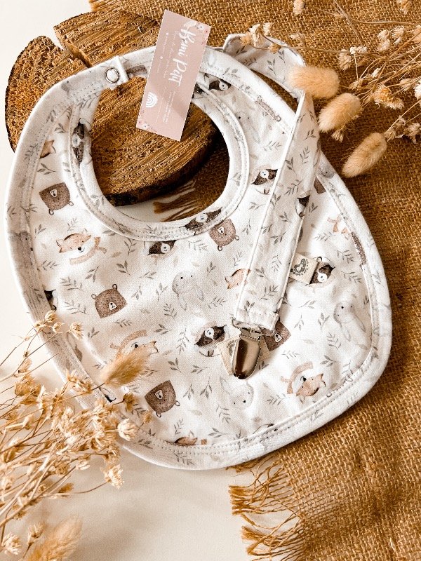 Producto - Babero + portachupete