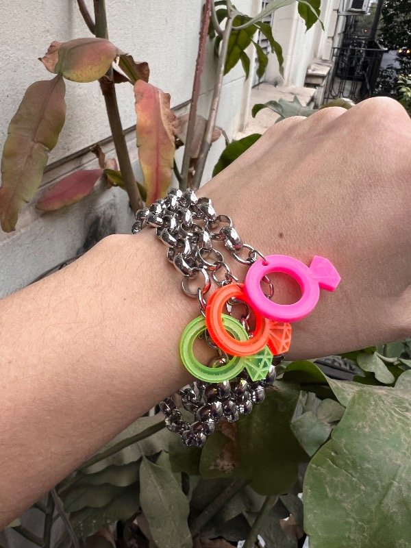 Producto - 2 pulseras rolo de acero con dije anillo