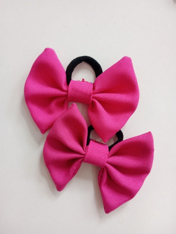 Producto - Par moños Fucsia