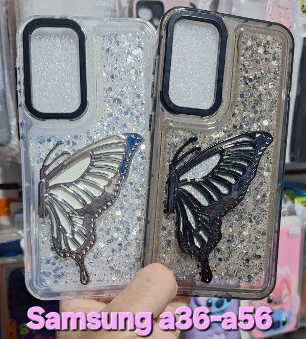 Producto - Fundas reforzadas glitter popsocket mariposa. Samsung a36-a56