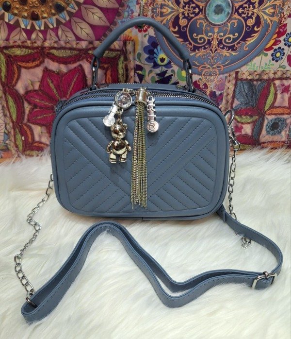 Producto - LINEA CRAZY CARTERITA MORRAL CRUZADO
