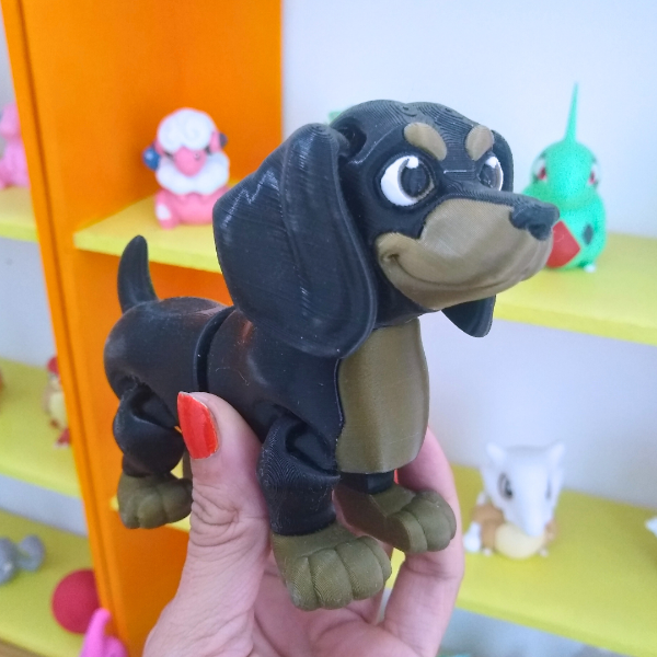 Producto - Perro salchicha articulado