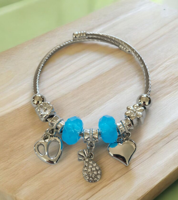 Producto - Pulsera acero dona turquesa corazon
