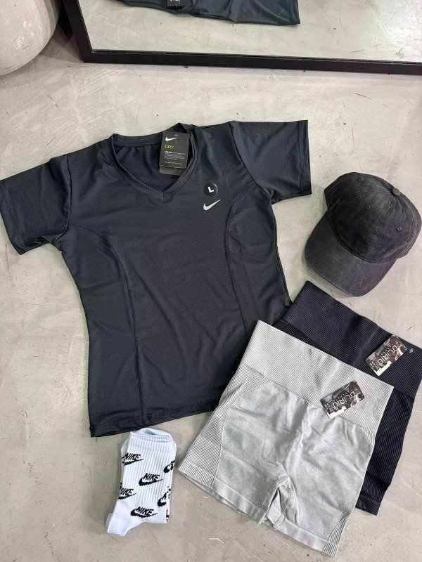 Producto - REMERA NIKE DRI-FIT DAMA (CURVA) - 8