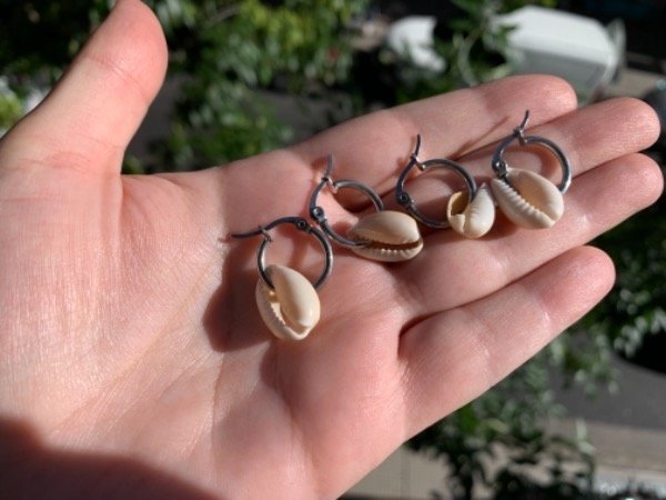 Producto - 5 pares de aros de acero con caracoles