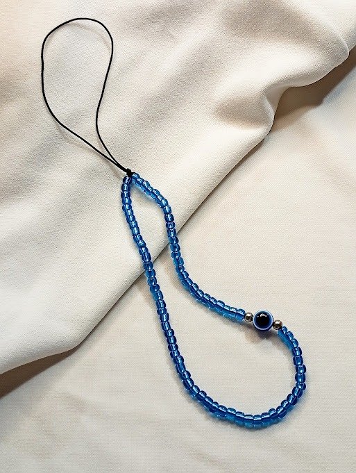 Producto - Strap phone ojo turco