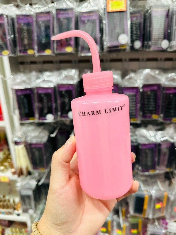 Producto - botella rosa charm