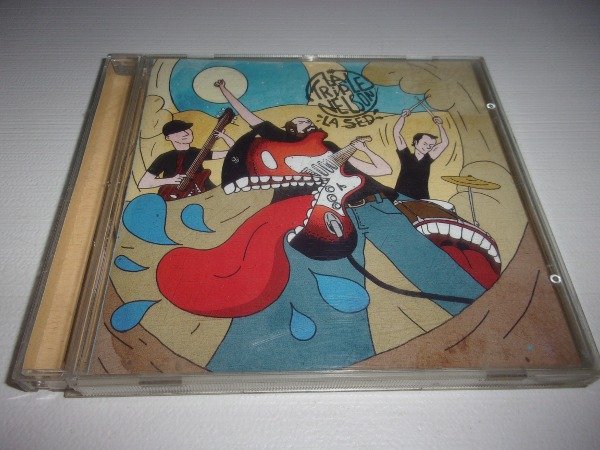 Producto - CD LA TRIPLE NELSON LA SED  ROCK URUGUAY 36C