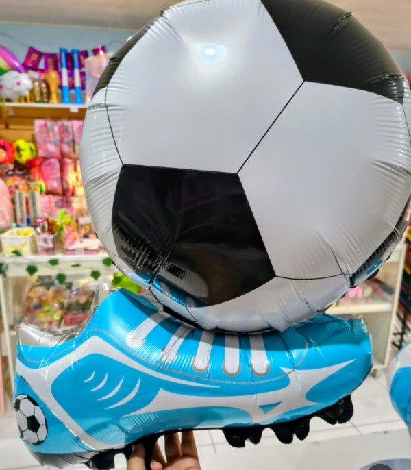 Producto - Botín de fútbol celeste