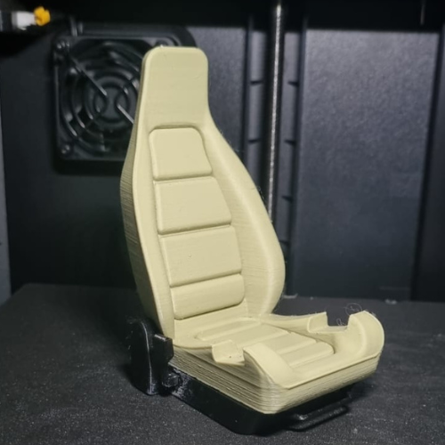 Producto - Apoya celular con forma de butaca de auto