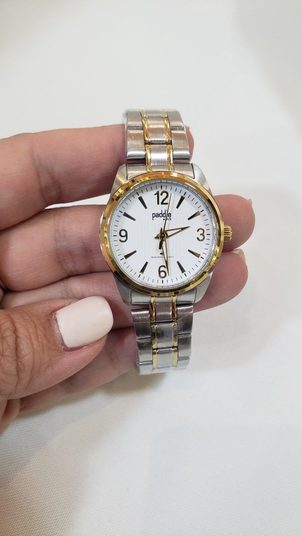 Producto - Reloj paddle metálico detalles dorados redondo