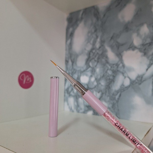 Producto - Liner Charm Limit rosa con strass y tapa