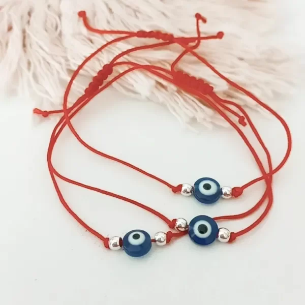 Producto - PULSERA CANCUN OJO ROJA