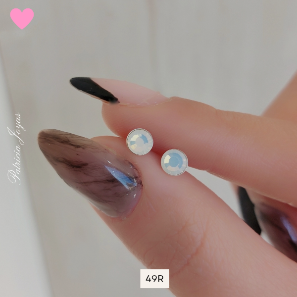 Producto - Aros abridores cubics blanco