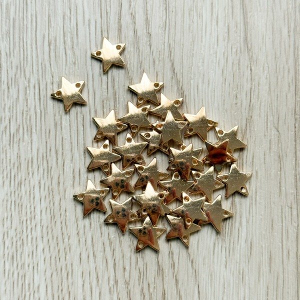 Producto - Dije Estrella Dorada x 5u