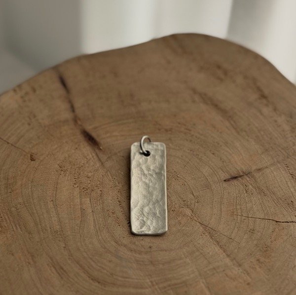 Producto - DIJE IMPACTO