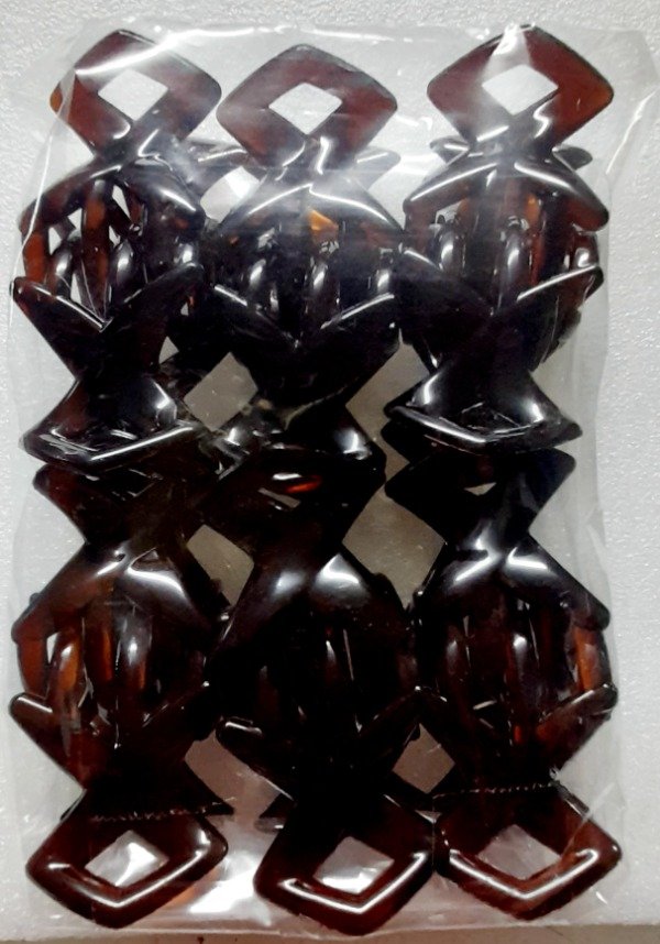 Broche moño carey irrompible