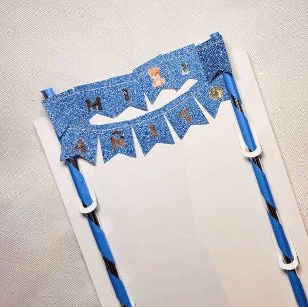 Producto - Banderin para torta con glitter MI 1 AÑITO celeste y plata