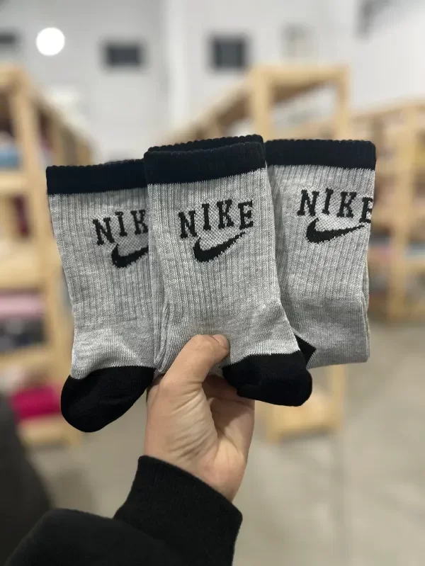 Media 3/4 nike gris