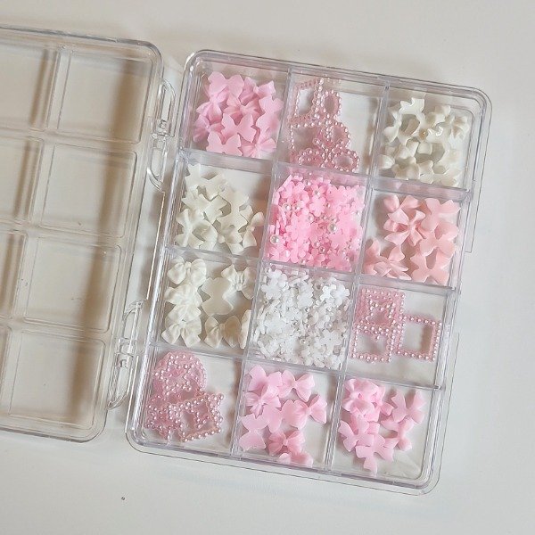 Producto - Cajita con dijes surtidos