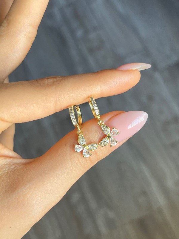 Producto - Aros Colgate Mariposa con cubic acero dorado