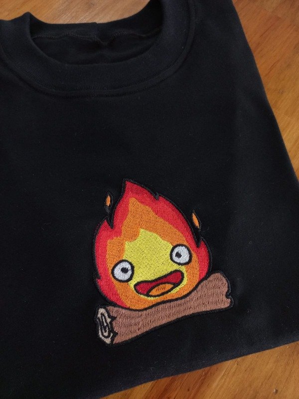 Producto - Remera Calcifer (El castillo ambulante HOWL)