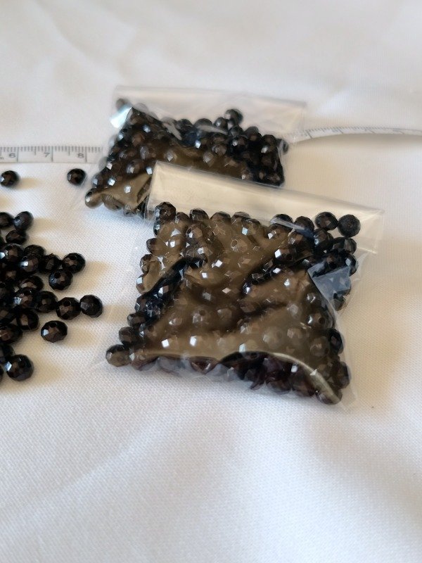 Producto - Donas fasetadas negras 6 mm