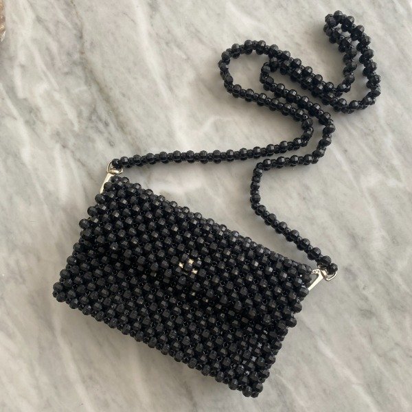 Producto - Dominga negro con tira desmontable