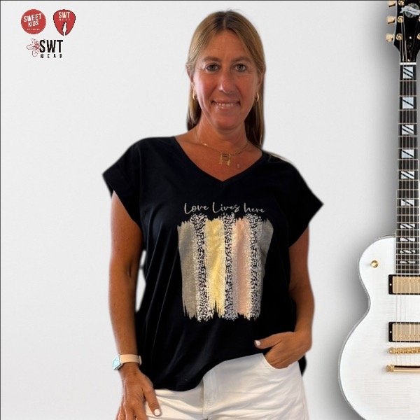 Producto - Remerón SIN MANGAS LOVE LIVES HERE Escote en V Algodón