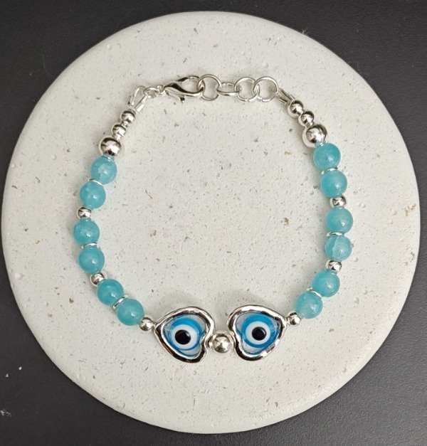 Producto - Pulsera Piedras Cristal Celeste con dos Corazones con Ojos
