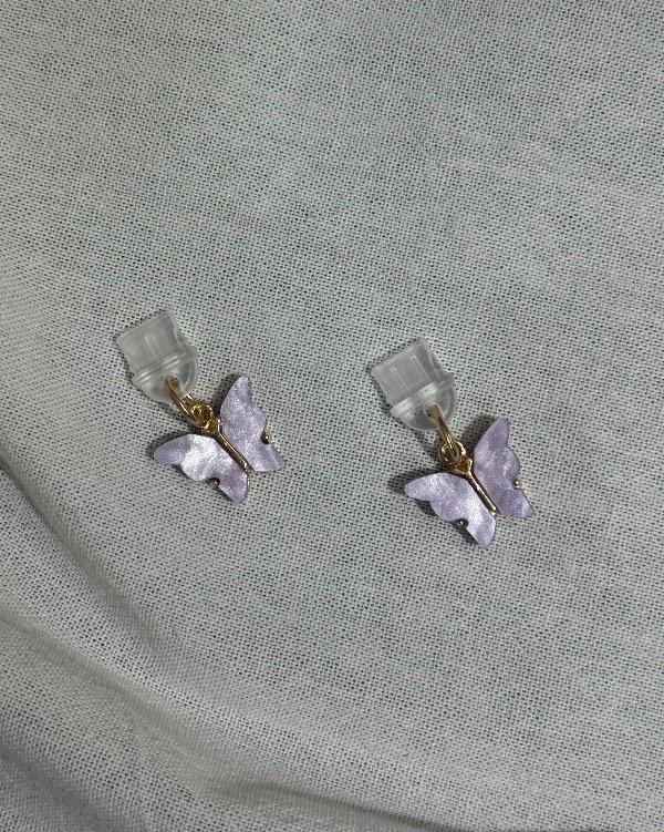 Producto - Anti polvo mariposa lila