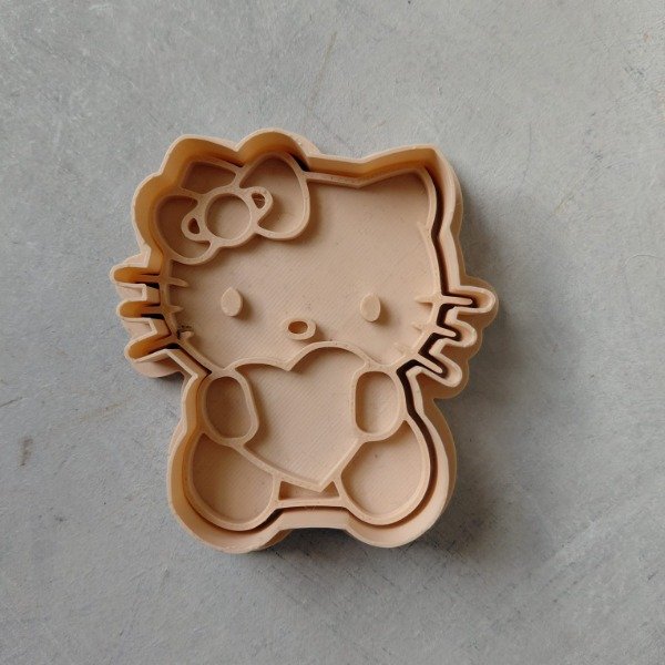 Producto - KITTY con CORAZON en la MANO