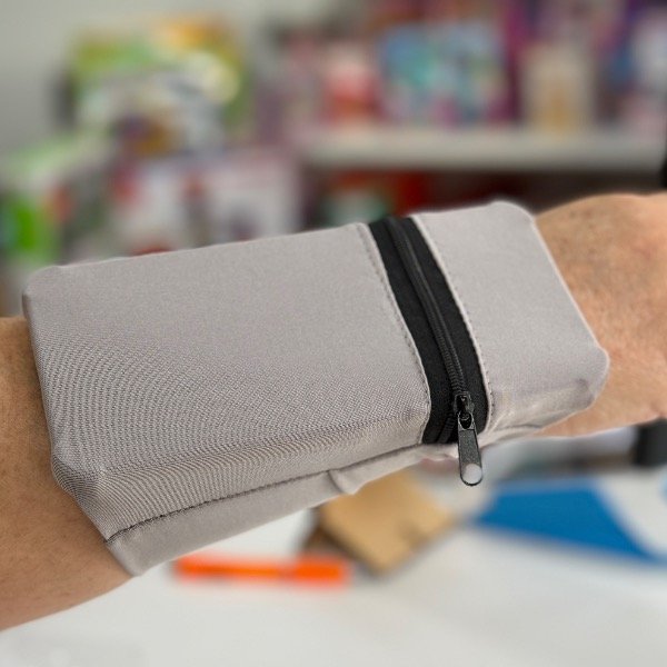 Producto - Muñequera Portacelular Guarda Objetos 6973