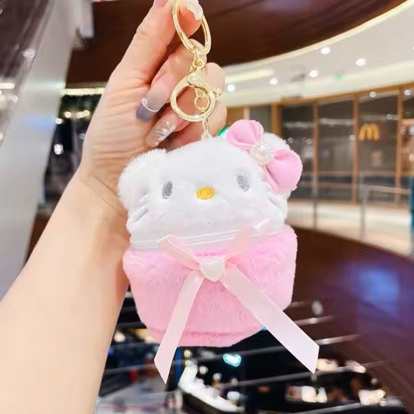 Producto - Hello Kitty monedero porta auriculares peluche 8x9 cm