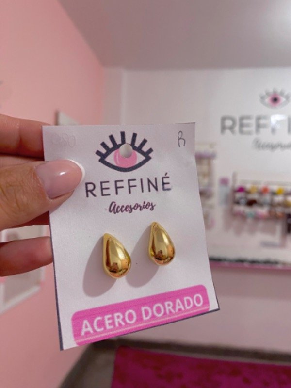 Producto - Pasante acero dorado 082