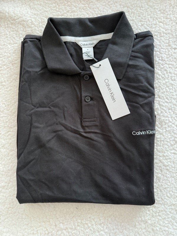 Producto - Chomba Ck Negra