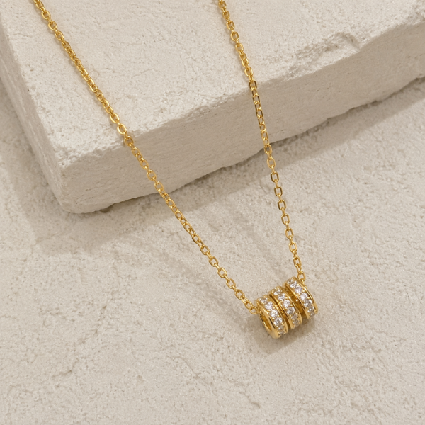 Producto - Collar triple rueda baño oro PL