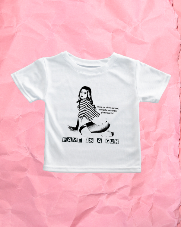 Producto - FAME IS A GUN- BABY TEE