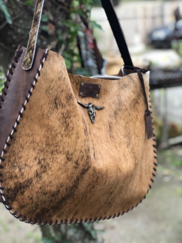 Producto - Cartera pelo natural cuero
