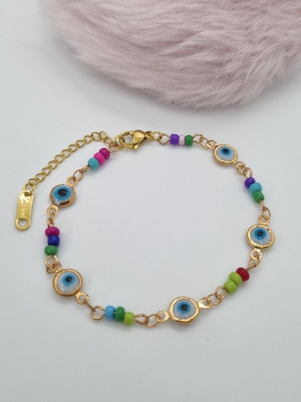 Producto - Pulsera acero dorado ojitos turcos mostacillas colores
