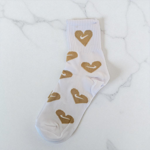 Producto - Nike corazon beige