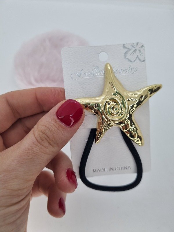 Producto - Colita elast negra aplique estrella de mar dorada